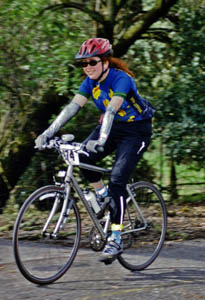 souvenir photograph of Arlene riding her bicycle at the 2006 Cinderella Classic