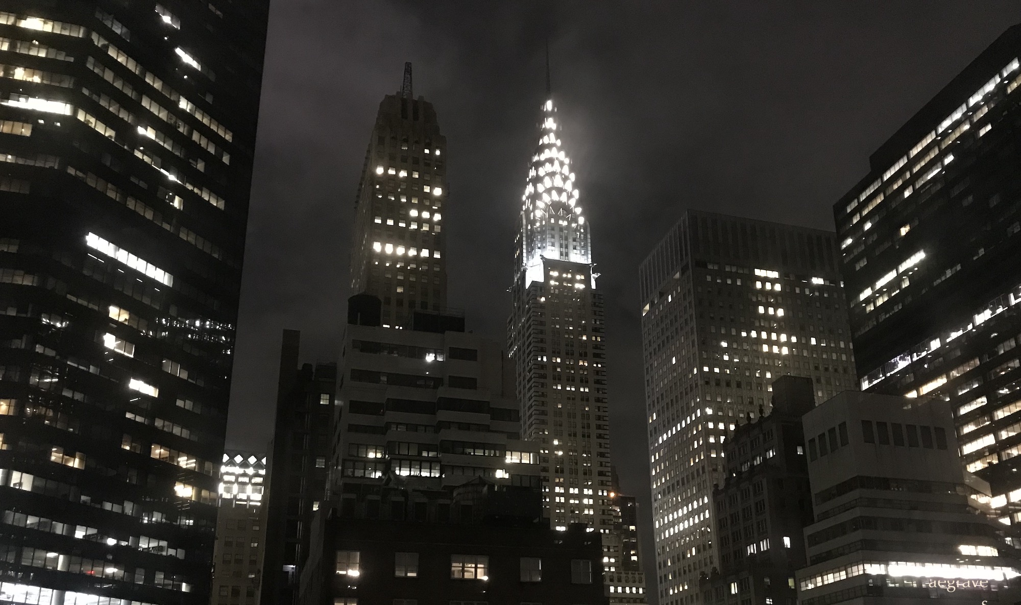 photo of the NYC skyline at night by A.E. Graves