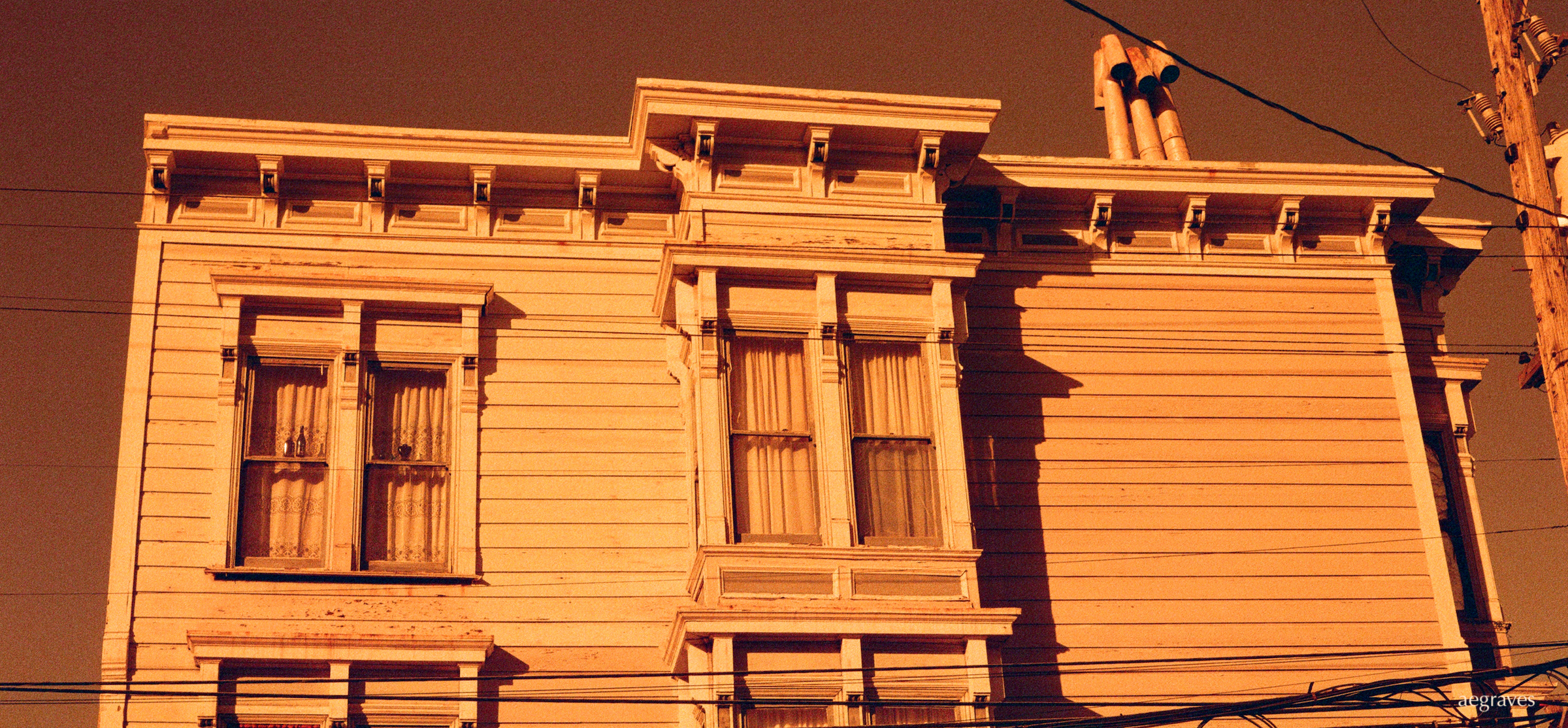 detail from photo of a Mission District home shot on Lomography Redscale film by A.E. Graves